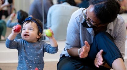 Baby and Caregiver at Music Class