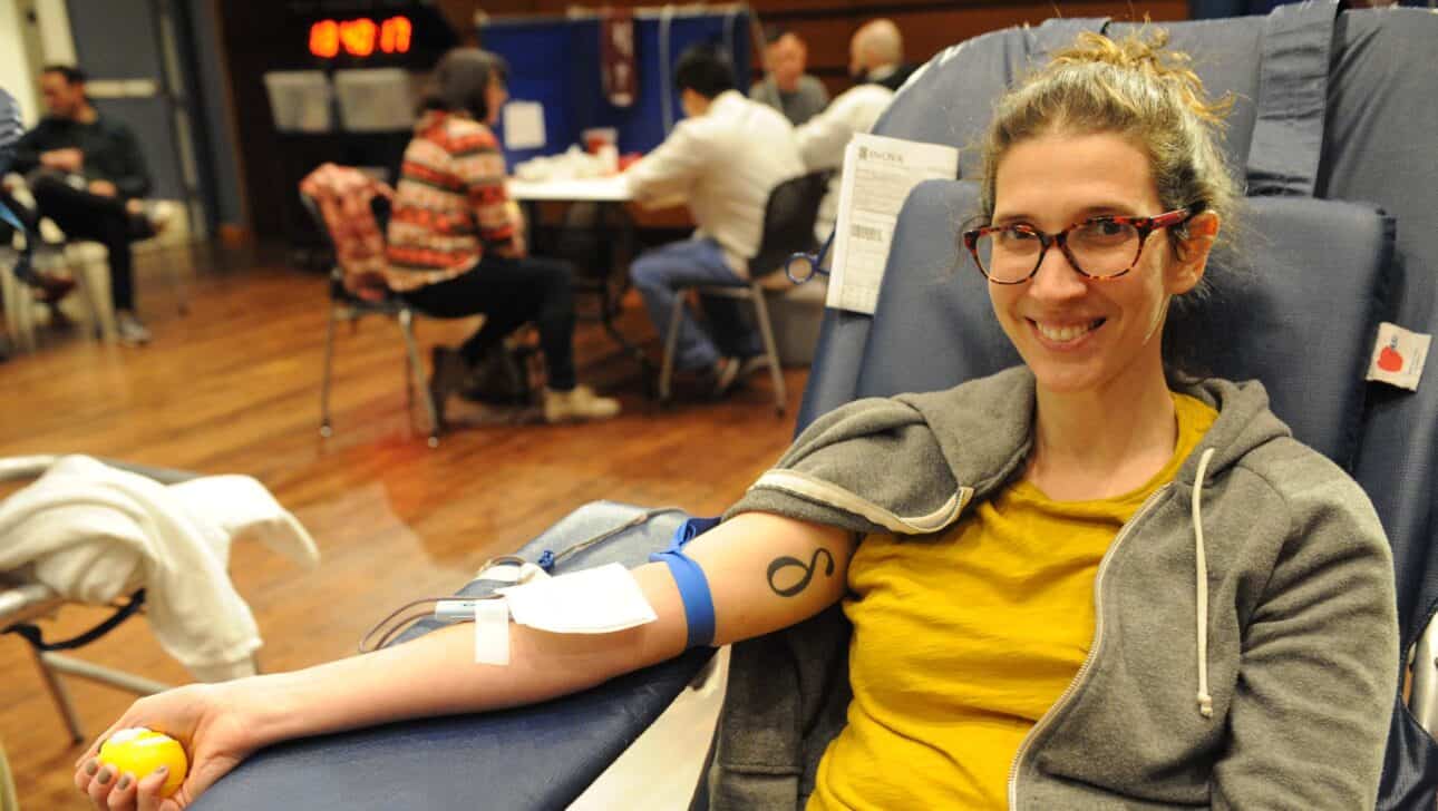 woman donating blood.