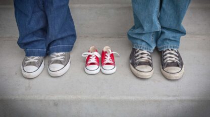 3 pairs of childrens shoes.