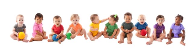 Babies in rainbow colored outfits