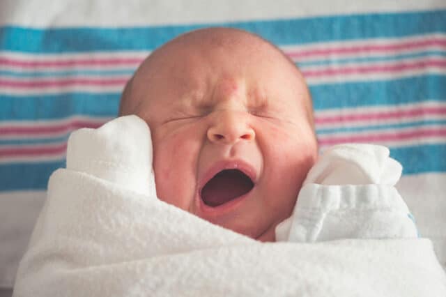 newborn, sleepy, yawning