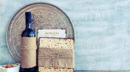 Image of Passover Seder plate, matzoh, and wine
